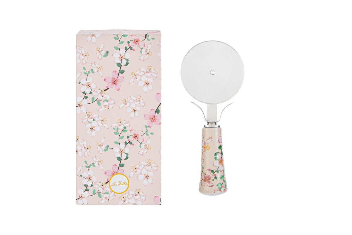 Magnolia: bomboniera rotella taglia pizza