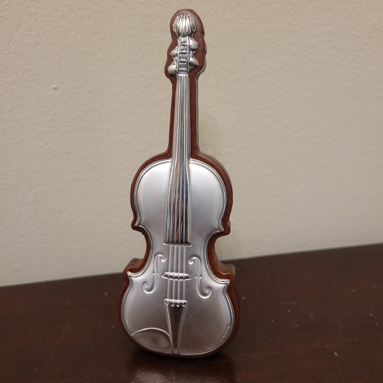 Violino in legno e argento