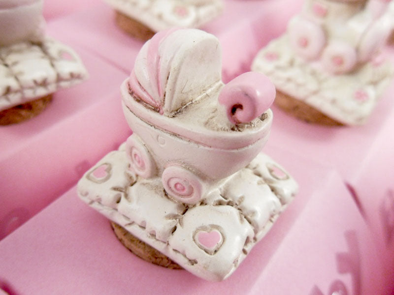 bomboniera tappo resina rosa carrozzina