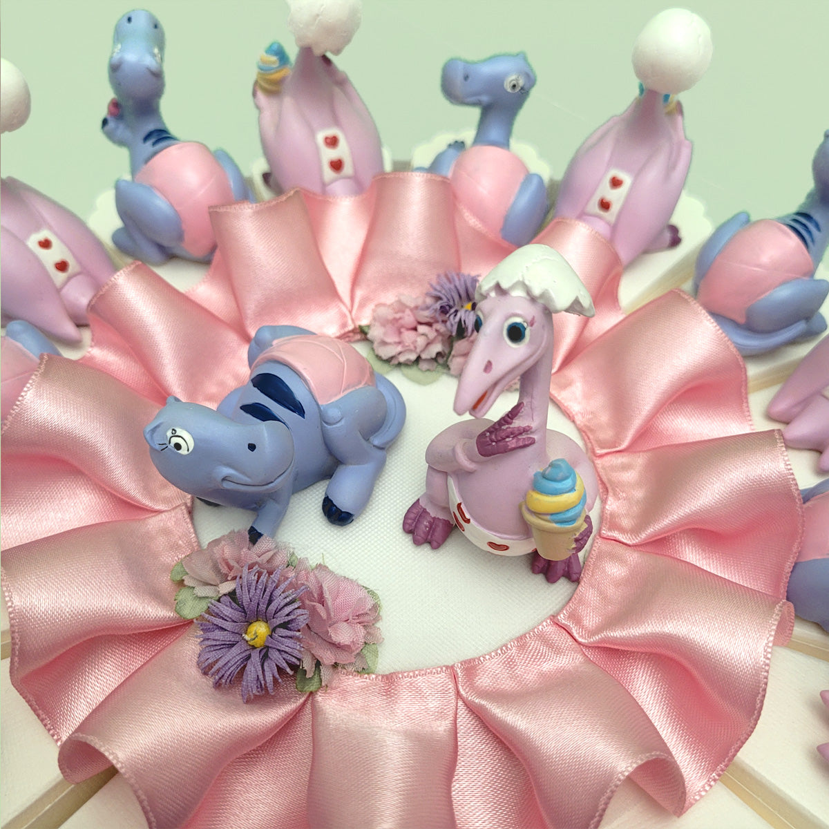 Torta bomboniera con dinosauri baby per bimba