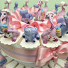 Torta bomboniera con dinosauri baby per bimba