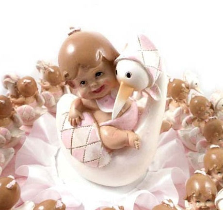Stock salvadanaio bimba con cicogna rosa, bomboniera nascita e
